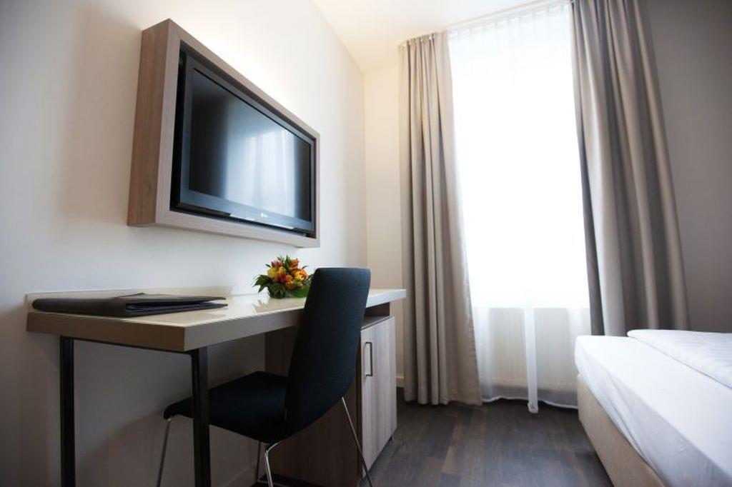 Manhattan Hotel Frankfurt pe Main Cameră foto
